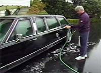 Bill Clinton washes the White House limousine