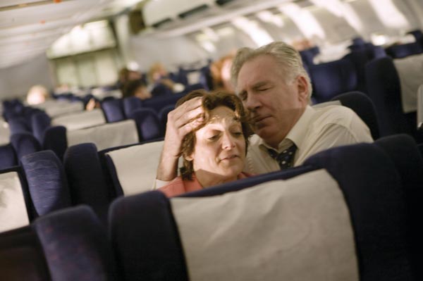 Passengers comfort each other in United 93. 