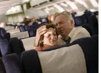 Passengers comfort each other in United 93 Click image to expand.