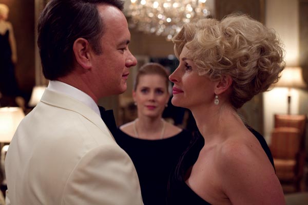 Tom Hanks, Amy Adams, and Julia Roberts in Charlie Wilson's War.