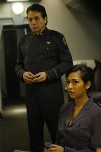 Edward James Olmos (left) and Tory Foster in the Sci Fi Channel's Battlestar Galactica. Click image to enlarged view.
