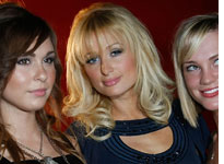 Paris Hilton and her new BFFs. Click image to expand.