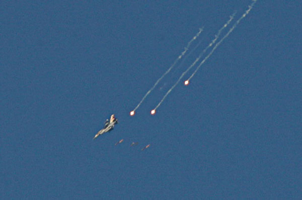 Flares described as missiles.