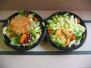 Fat is where the flavor's at: California Cobb (left) vs. Chicken Caesar