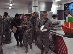 US soldiers walk in a the mess hall at Bagram Air Base. Click image to expand.