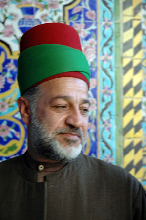 A shrine guide at Karbala.