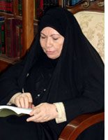 Dr. Amal Kashif al-Ghita in her home
Click image to expand.