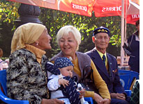 Kazakhs at a street festival. Click image to expand.