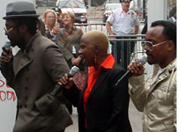 will.i.am, Angelique Kidjo, and apl.de.ap peform "In My Name." Click image to expand.