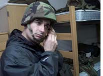 Abdullah Sati, ABTV, tries on his Kevlar helmet 