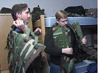Jim Sciutto, ABC News, and Eric Westervelt, NPR News, try on their Kevlar jackets