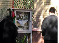 Families pray above their relatives every Friday 