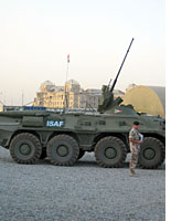 ISAF vehicle with the Darulaman Palace in the background
