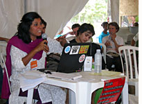Shalmali Gultal, a development specialist from India who works at the organization Focus on the Global South, lecturing on how to tame the power of multinational corporations