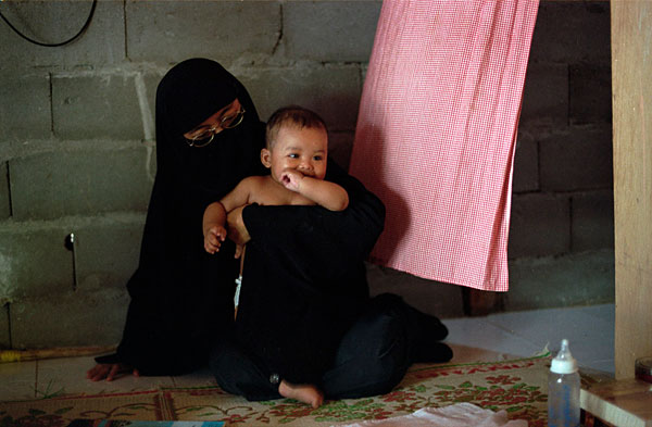 Paridah with her youngest child, Osama.