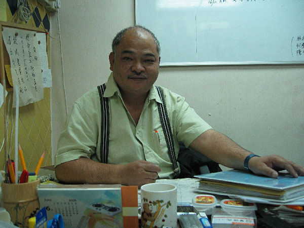 "The Bull," Tsang Kin Shing, in his office in Chai Wan last Friday.