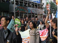 Scene from the Dec. 4 march for universal suffrage in Hong Kong. Click image to expand.