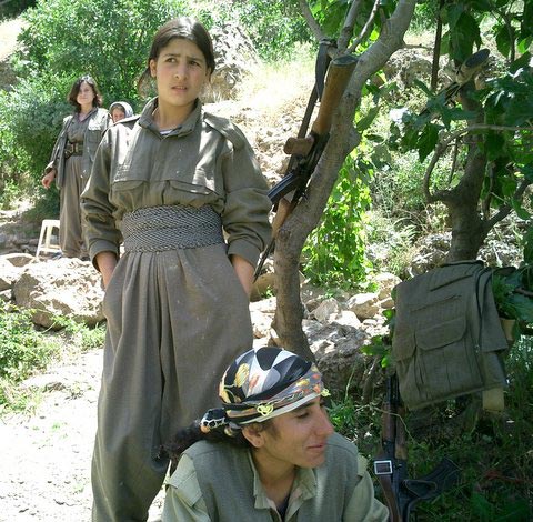 Guerrillas in the Shahid Harun (Aaron the Martyr) camp.