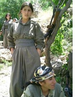 Guerrillas in the Shahid Harun camp. Click image to expand.