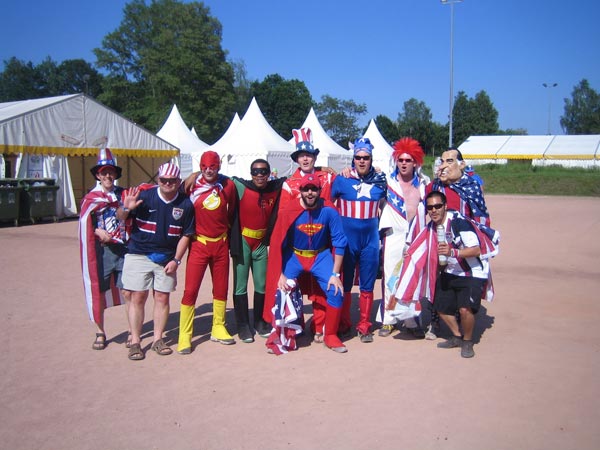 The superheroes get ready for the game.