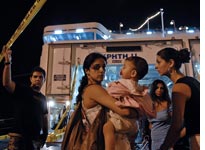 Evacuees arrive in Cyprus. Click image to expand