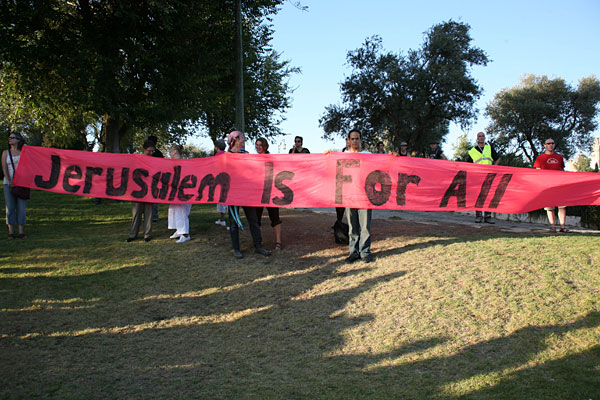 The "Jerusalem Is for All" banner is unfurled.