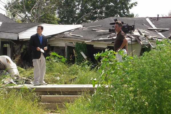 A television reporter in the Lower Ninth Ward.