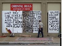 Anti-looting warning on St. Charles Avenue
Click image to expand.