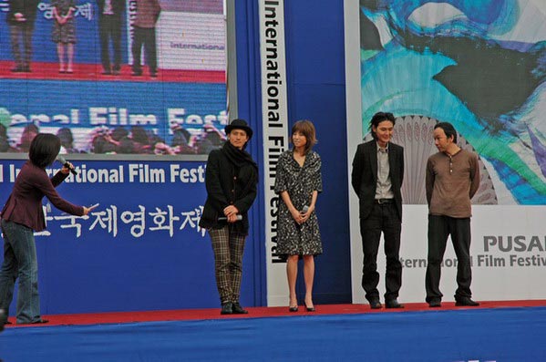 Asian cinema stars at the Pusan International Film Festival answer questions from the crowd at a Haeundae Beach pavilion.
