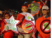Members of the "red-shirt army." Click image to expand.