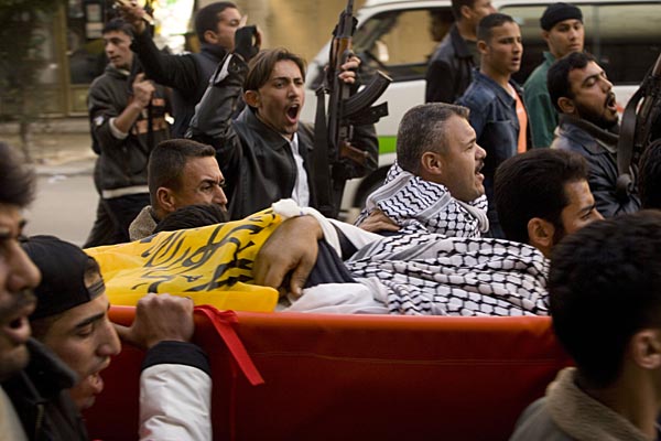 Mourners at the funeral of a Fatah member.