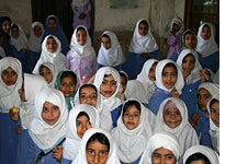 Schoolgirls in Bagh-i Fin Gardens, Kashan. Click image to expand.