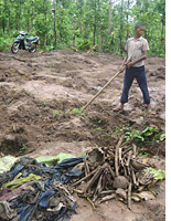 A boy digs through the bones and rags 
Click image to expand.