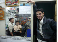 An Iraqi-owned barbershop in Damascus. Click image to expand.