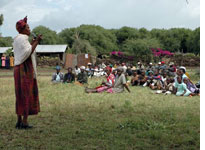 Karambu Ringera campaigns in a rural area 
Click image to expand.