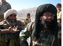 Naiz Mohammad (in sunglasses and black turban). Click image to expand.