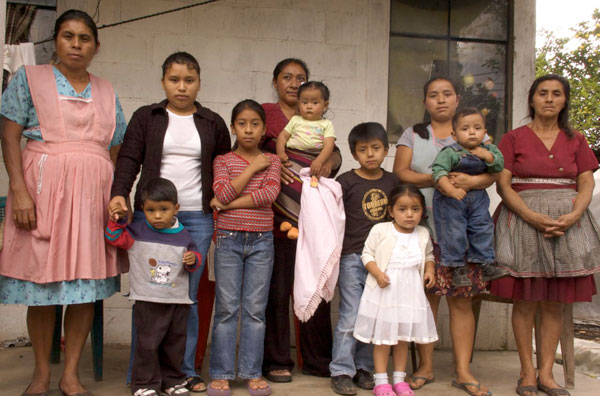 Family members of men captured by U.S. immigration authorities during a raid on the Agriprocessors Inc. meatpacking plant in Postville, Iowa, in May 2008. Hilda Gil, wife of Freddy Granados, stands second from the left.