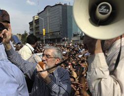 Defeated Iranian presidential candidate Mir Hossein Mousavi addresses supporters. Click image to expand.