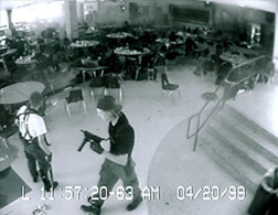 Eric Harris and Dylan Klebold during the Columbine attack, captured by surveillance camera. Click image to expand.