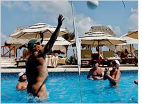 In photographing nudists, the Times proves playfully shy. Click image to see the slide show.