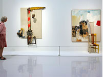 People look at 'Pilgrim' (L) and 'Aen Floga' by Robert Rauschenberg. Click image to expand.