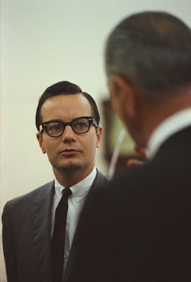 President Lyndon Johnson with Bill Moyers (left).