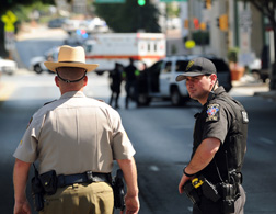 Police in front of the Discovery Channel headquarters.
