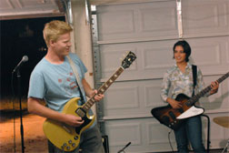 Jesse Plemons as Landry Clarke and Stephanie Hunt as Devin Corrigan 