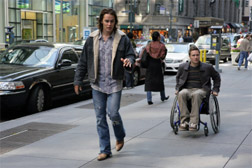Taylor Kitsch as Tim Riggins, Scott Porter as Jason Street.