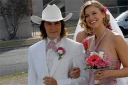 Taylor Kitsch as Tim Riggins, Adrianne Palicki as Tyra Collette