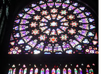 A stained-glass window in the Basilica of St. Denis, which is considered the first cathedral built in the Gothic style