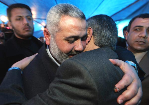 Congratulating senior Hamas leader Ismail Haniya. 