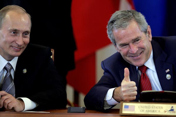 Vladimir Putin and George W. Bush.