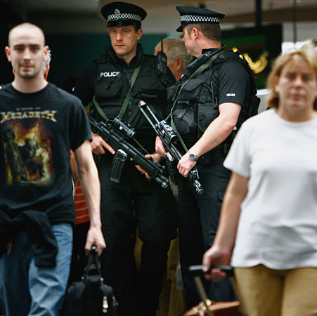 Police patrol Glasgow Airport two days after the attempted car-bombing.